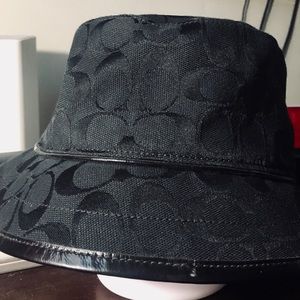 Coach Hat. Black with pink satin interior